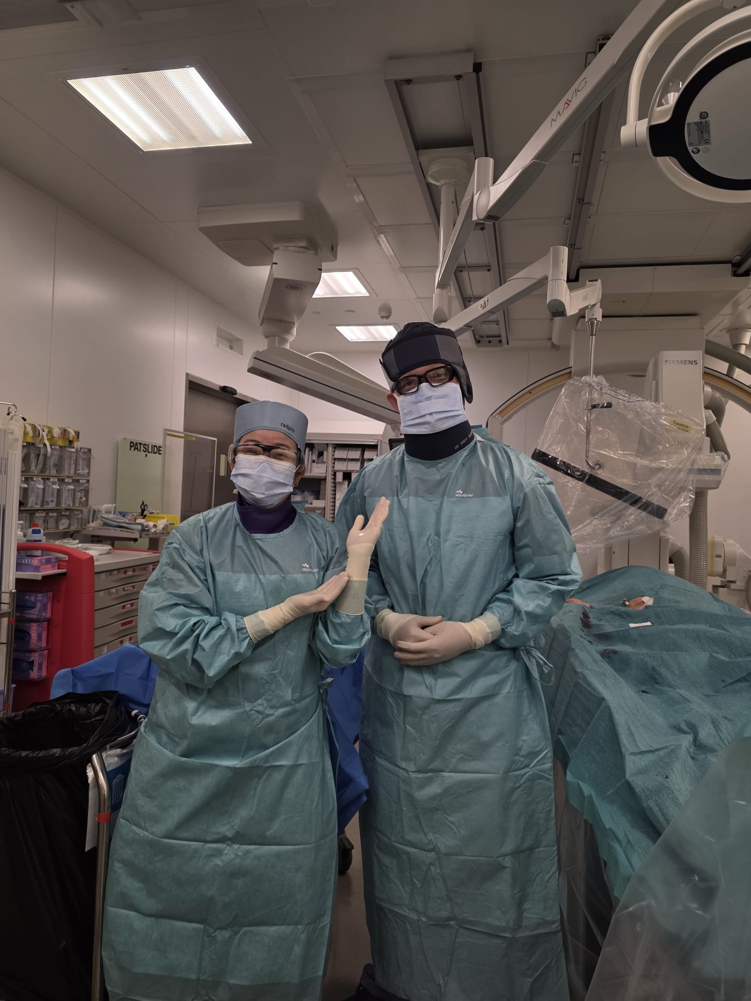 Dr Andy Sukmadja scrubbed in with consultant Singapore