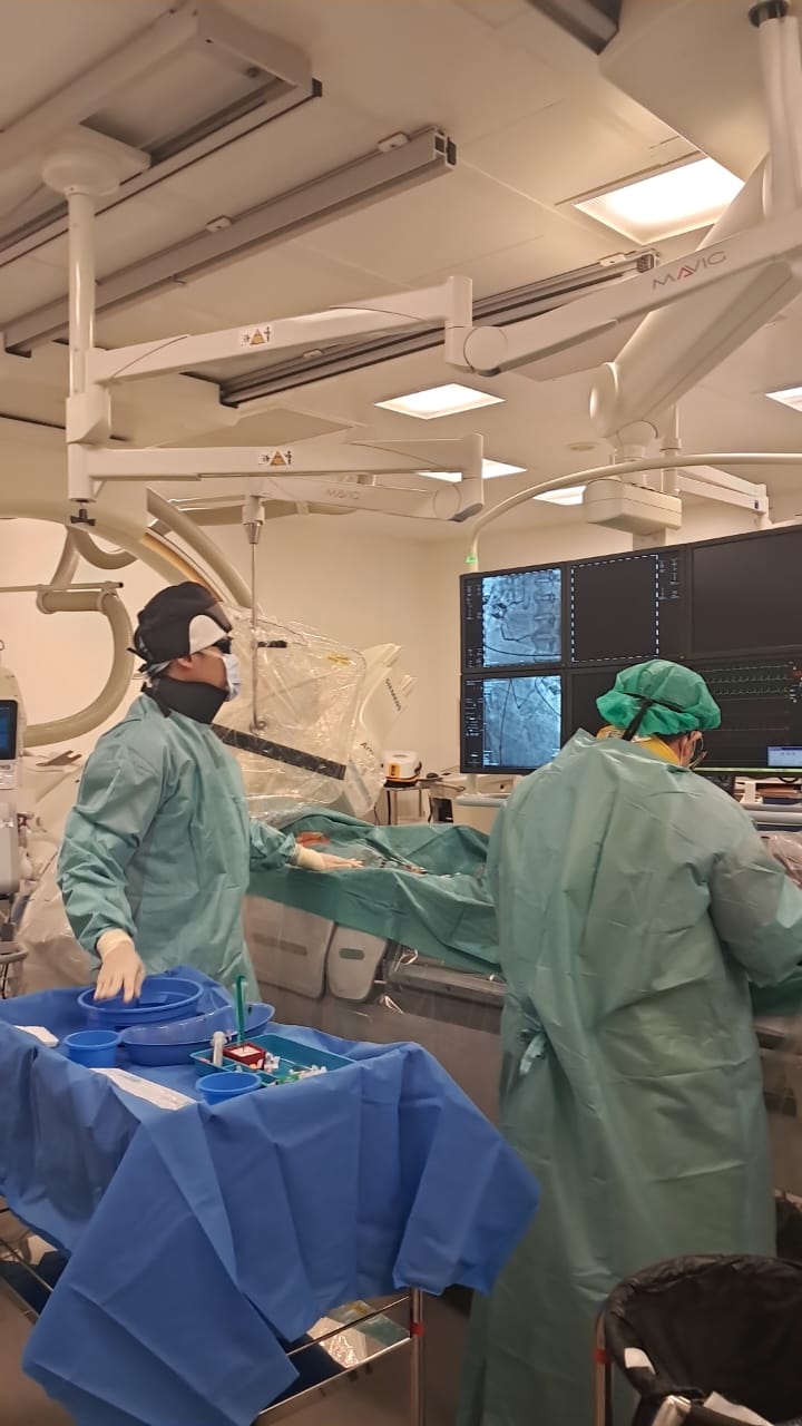 Dr Andy Sukmadja performing PCI procedure in cath lab Singapore